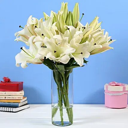 6 White Oriental Lilies in Glass Vase